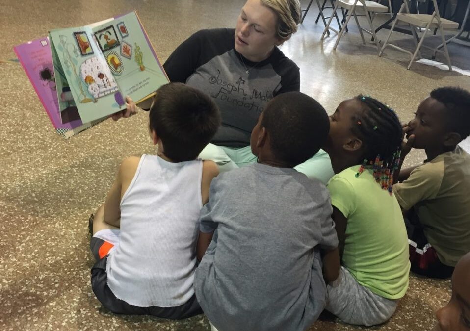 Jen Money-Brady Showing book images to kids