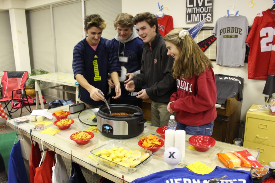 teens serving Chili out of pot