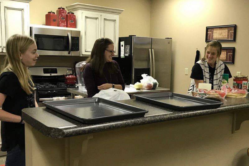 Sibling in a cooking class.