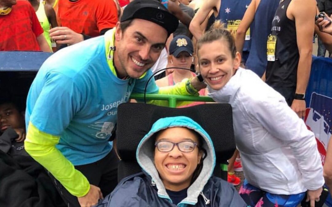 Tim and Melissa Gee pose with a Run Together participant.