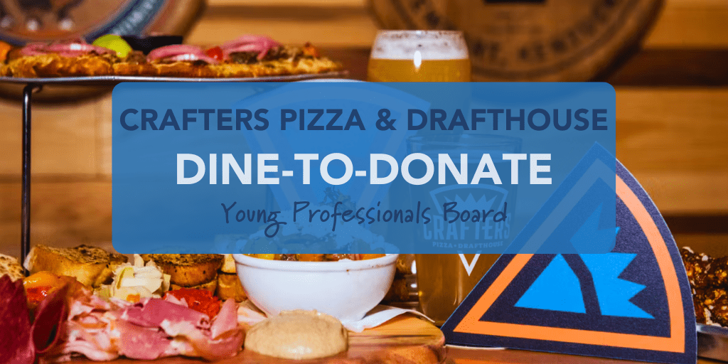 Various kinds of food laid out on table, alongside triangle cutouts of Crafters logo. Overly text says: Crafters Pizza & Drafthouse Dine-to-Donate Young Professionals Board